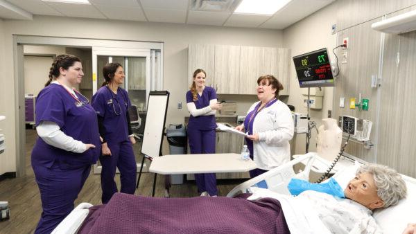 Nursing teacher giving instruction